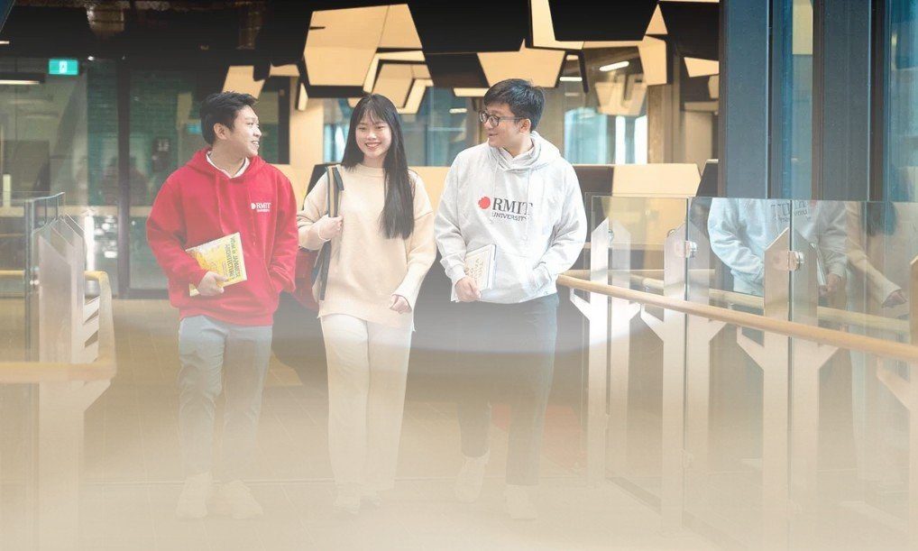 Students walking and talking through a modern building